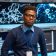 contemporary-young-programmer-standing-by-workplac-BPCK7CT.jpg